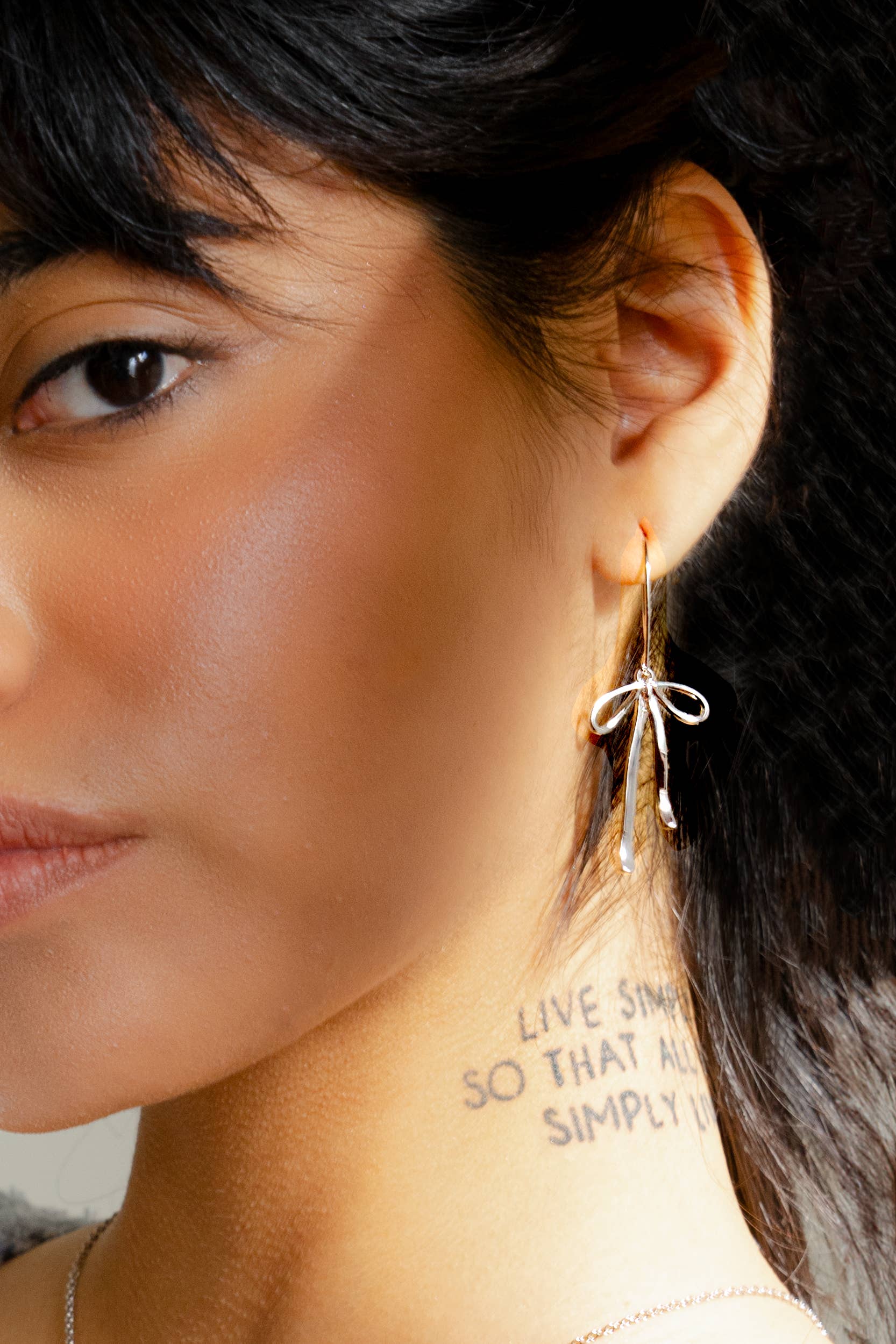 Bad to the Bow Earrings - Silver Rhodium Plated