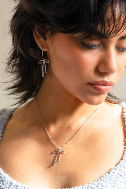 Bad to the Bow Earrings - Silver Rhodium Plated